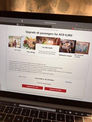 BUYERS BEWARE-Bait and switch-False advertising Received email from Emirates about upgrading our upcoming trip .