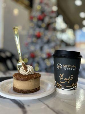 Biscoff cheesecake with a Mofowar coffee, in the customer seating area.