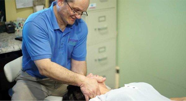 A trusting patient getting an all important cervical adjustment,
