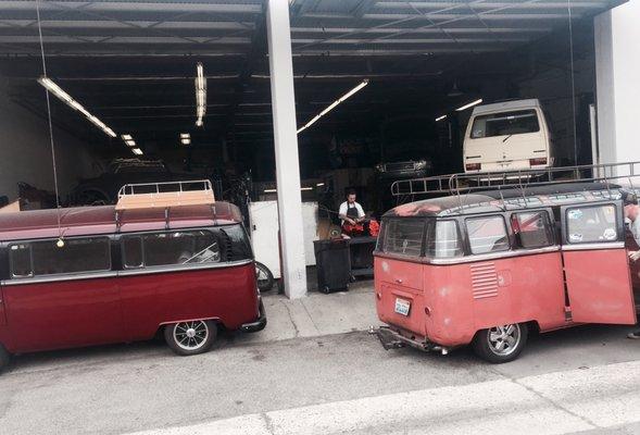 I like this picture in the rear of the shop lots of VW Buses.