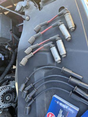New and used spark plug wires for a full tune up