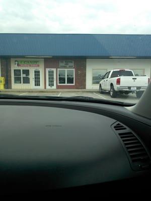 Located in the small strip mall