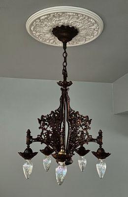 Love my early 1900s chandelier.  Bought at a great price while having several other lights rewired.