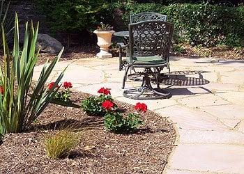 Tuscan Courtyard- The client wanted to transform her barren entry courtyard into a beautiful, low maintenance Tuscan garden.