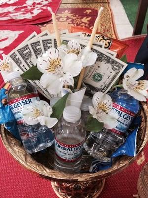 Sunday Thak baht and offerings.