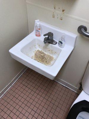 Disgusting something in the bathroom sink.