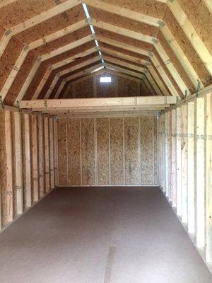 Interior lofts for overhead storage in barn style buildings