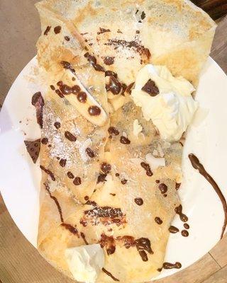 Crêpe with banana, chocolate sauce, crème chantilly.