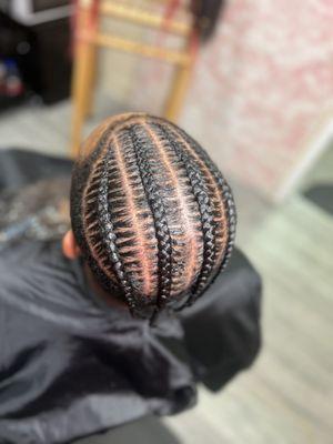 Men stitch braids
