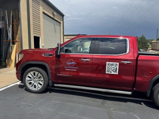 A side view of signage placed on my vehicle by image360