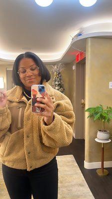 In the salon lobby waiting for the elavator