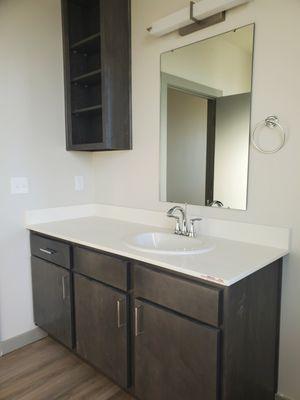 Extra large bathrooms with built in storage.