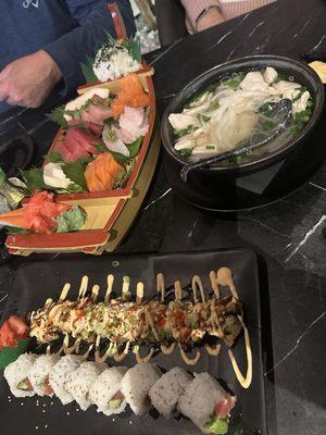 Sushi boat, chicken pho, specialty roll, spicy tuna roll