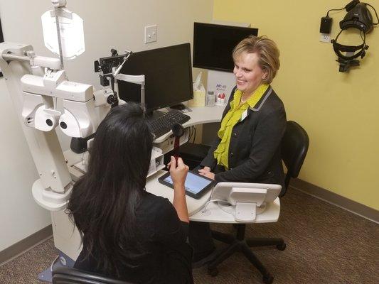 Dr. Durick performing a comprehensive eye exam.