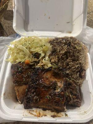 Jerk chicken, cabbage, rice.