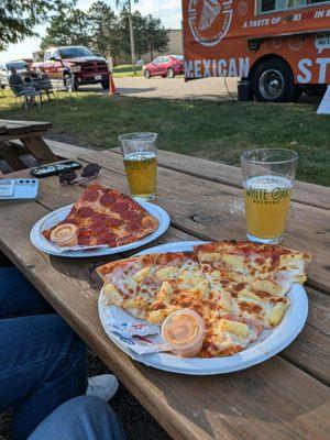 Slices of pepperoni and Hawaiian