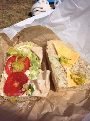 Turkey sandwich on old dry bread that has no softness to it.