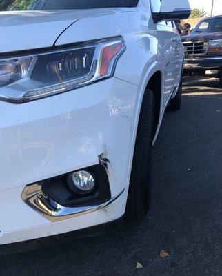 Front view of damage of front bumper