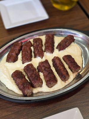 Ćevapi over kajmak, really good!