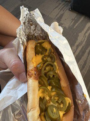 Jumbo, chili, cheese and jalapeño hotdog. The bun is nice and soft.