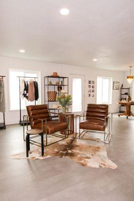 A place for your man to sit while you try on fabulous clothing.