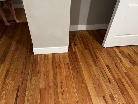 Waxy/wet stain on floor