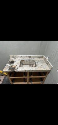 Integrated sink vanity with 4 inch backsplash