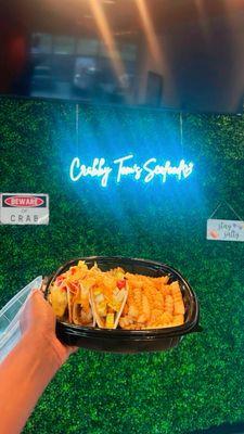 Shrimp tacos with fries