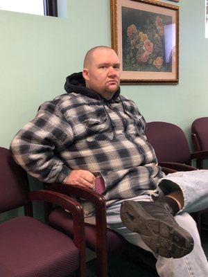 My hubby in the waiting room.