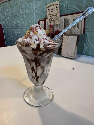 soft serve, chocolate sauce and sprinkles, singles 3$, doubles 5$ add 1$ for topping.