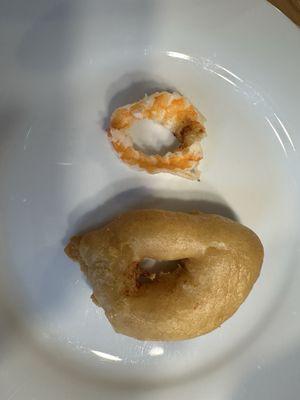 This is a piece of Sweet & Sour Shrimp with the batter and what is inside when the batter is removed.