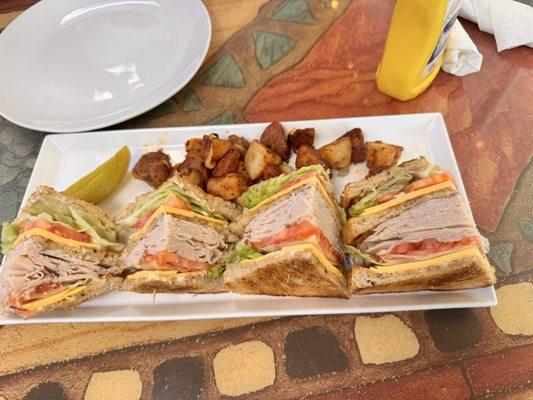 Turkey club with no bacon and breakfast potato's