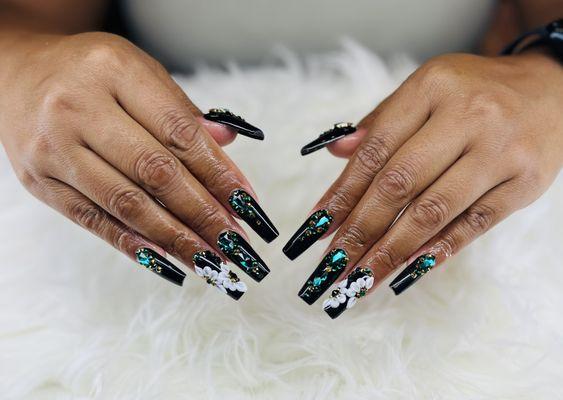 Green stones on black with 3D flowers