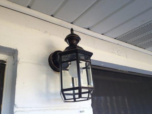 Installation of front porch motion sensor light.