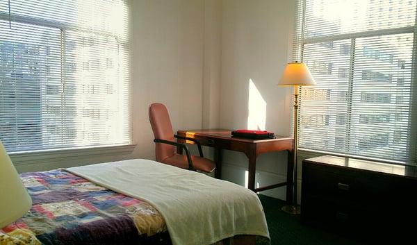 A sunny corner room overlooks Franklin at 12th Street in Oakland.