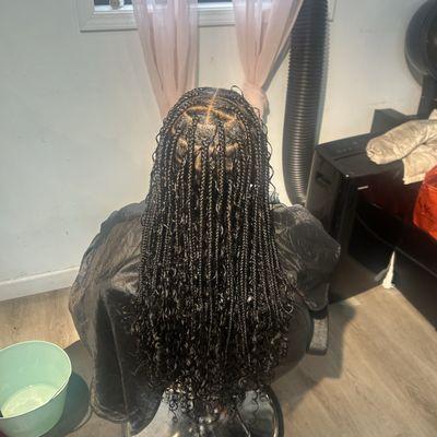 medium size knotless braids with Boho curls