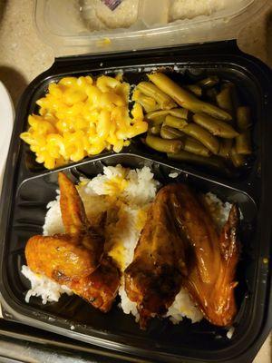 2 very meaty flavorful wings, Mac n cheese, green beans. This one meal satisfied both of us.