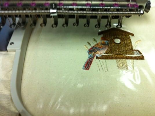 Busy embroidering on my industrial embroidery machine