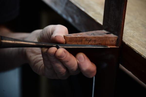 Cutting new angle on the heel of the neck for a neck reset