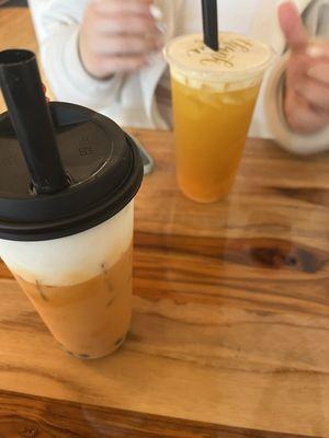 thai milk tea with sweet cold foam & passionfruit paradise