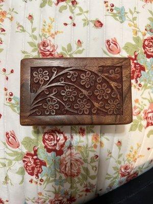 This beautiful wooden engraved box for his ashes.