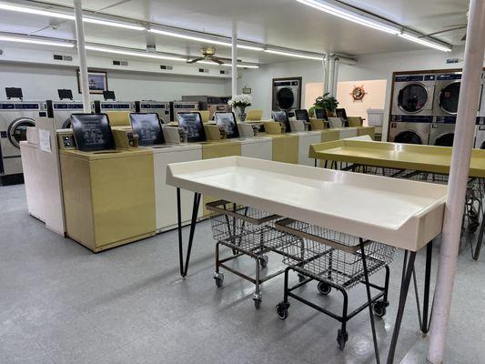 Plenty of tables to fold laundry.