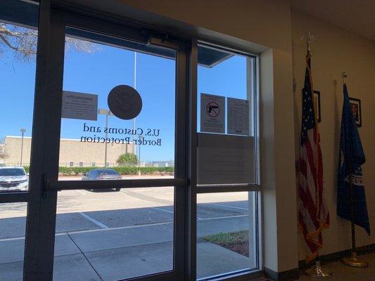 Front door, looking out from lobby.