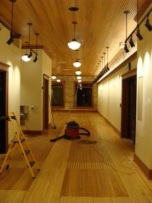 Cleaning up construction at the Port Emporium in Port Washington.