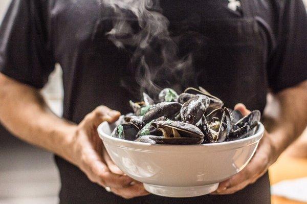Steamed mussels in coconut lemongrass broth with lime and cilantro.