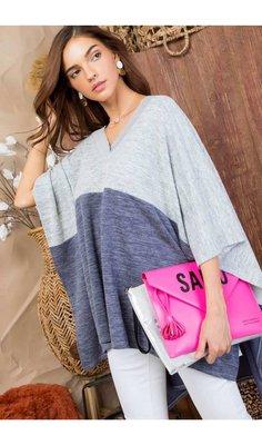 Color Block ponchos are trending this Season- and we've got you covered with this Blue on Blue