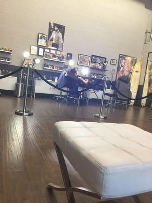 Him tattooing the eeveelutions on my boyfriend.