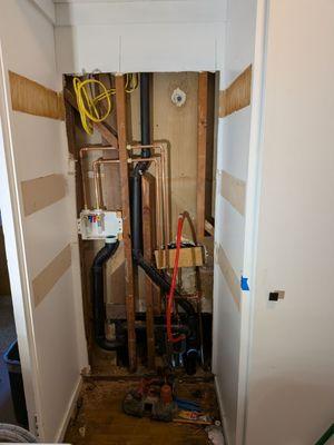 Final laundry plumbing, shower head not fixed because it's extra charge