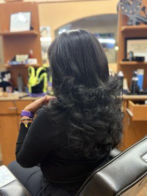 Haircut, blow dried.