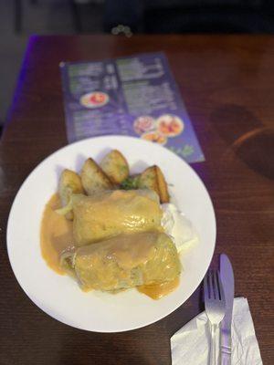 Stuffed cabbage rolls with potatoes and sour cream